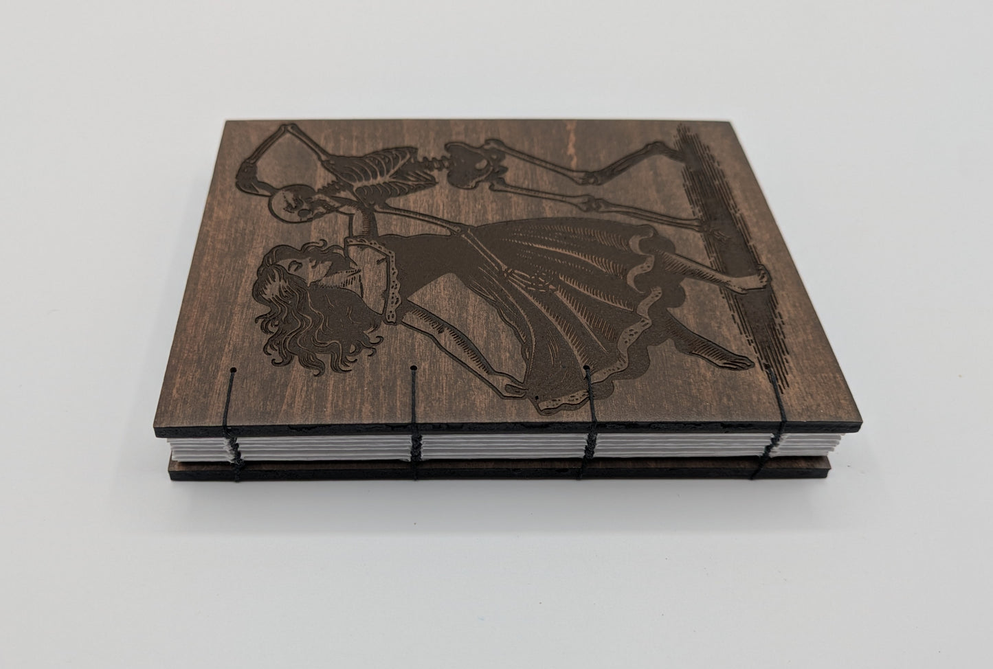Dancing skeleton and lady notebook