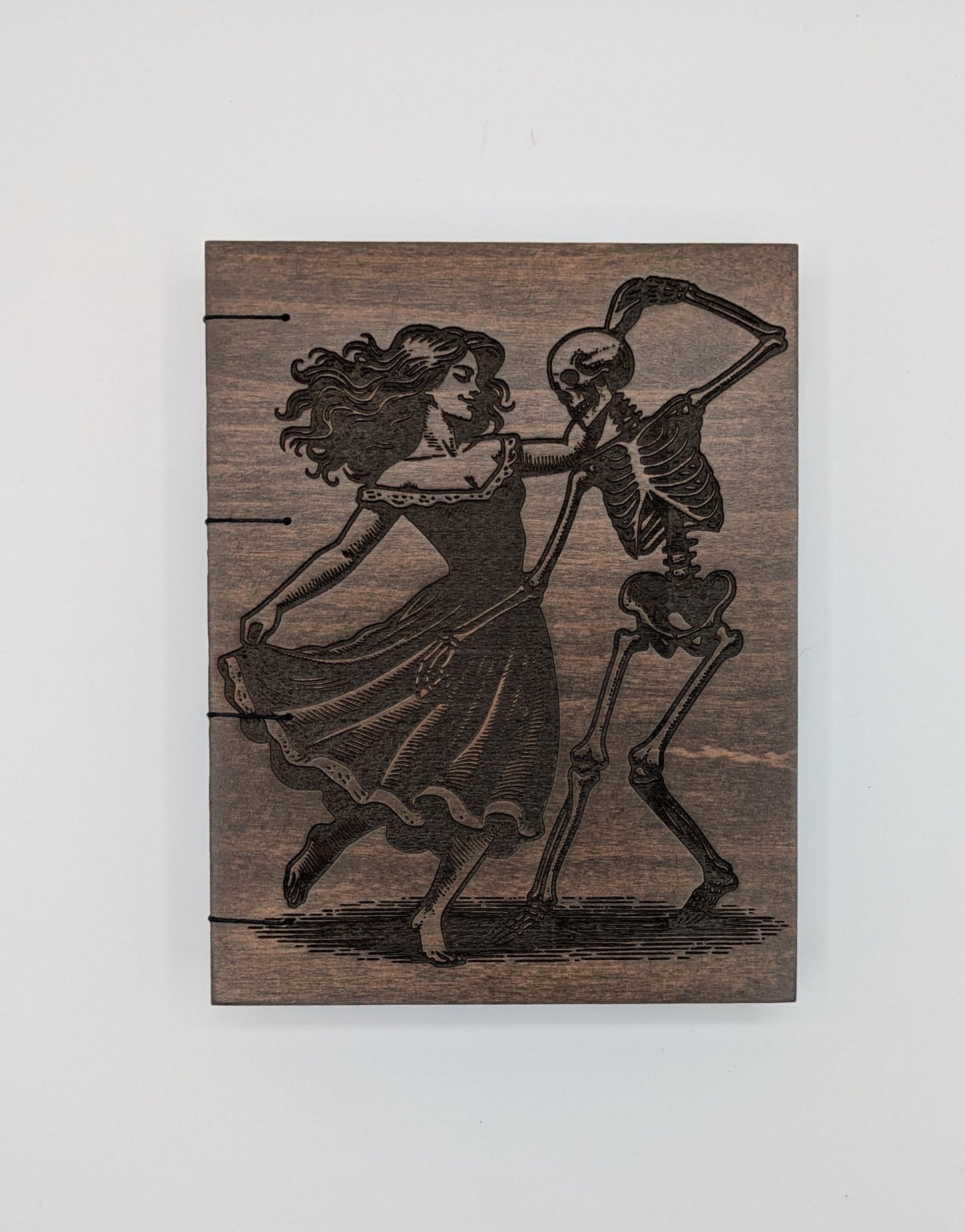 Dancing skeleton and lady notebook